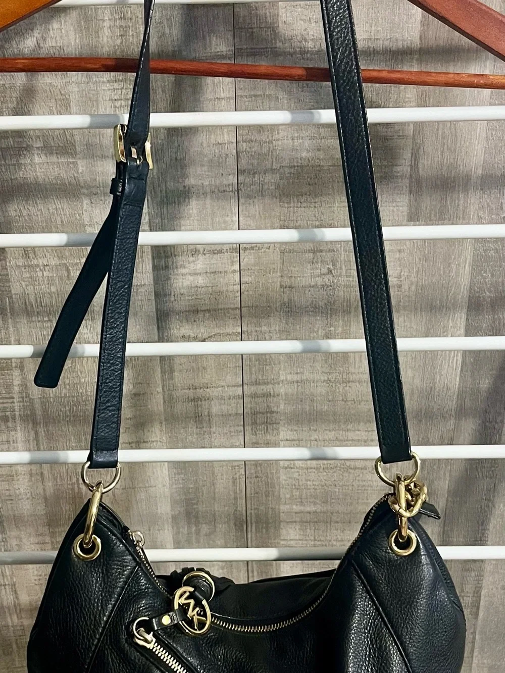 Michael Kors Black Pebbled Leather Hobo with Gold-Tone Tassel Charm